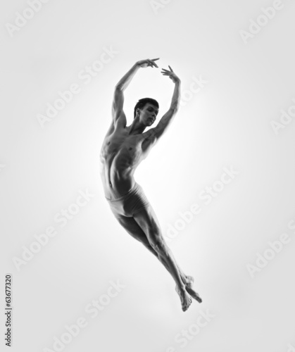 Sporty and athletic ballet dance. Black and white image.