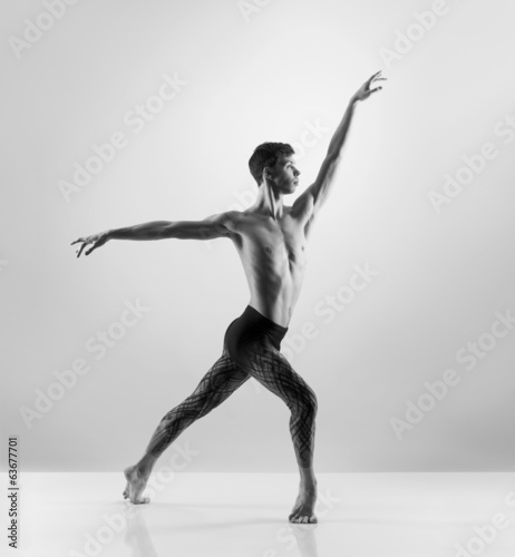 Sporty and athletic ballet dance. Black and white image.