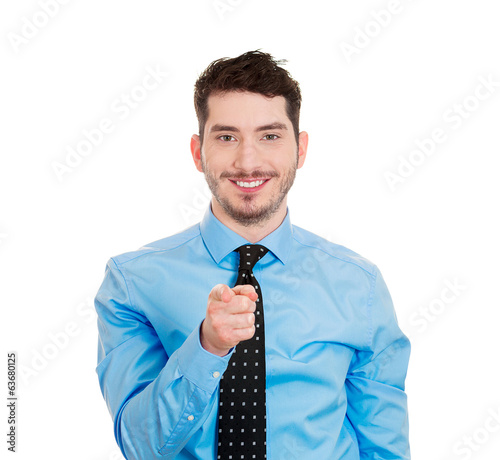 Smiling man pointing finger at camera you can do it gesture