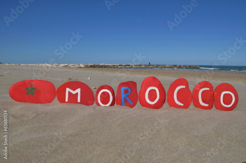 Morocco, souvenir on stones with beach background