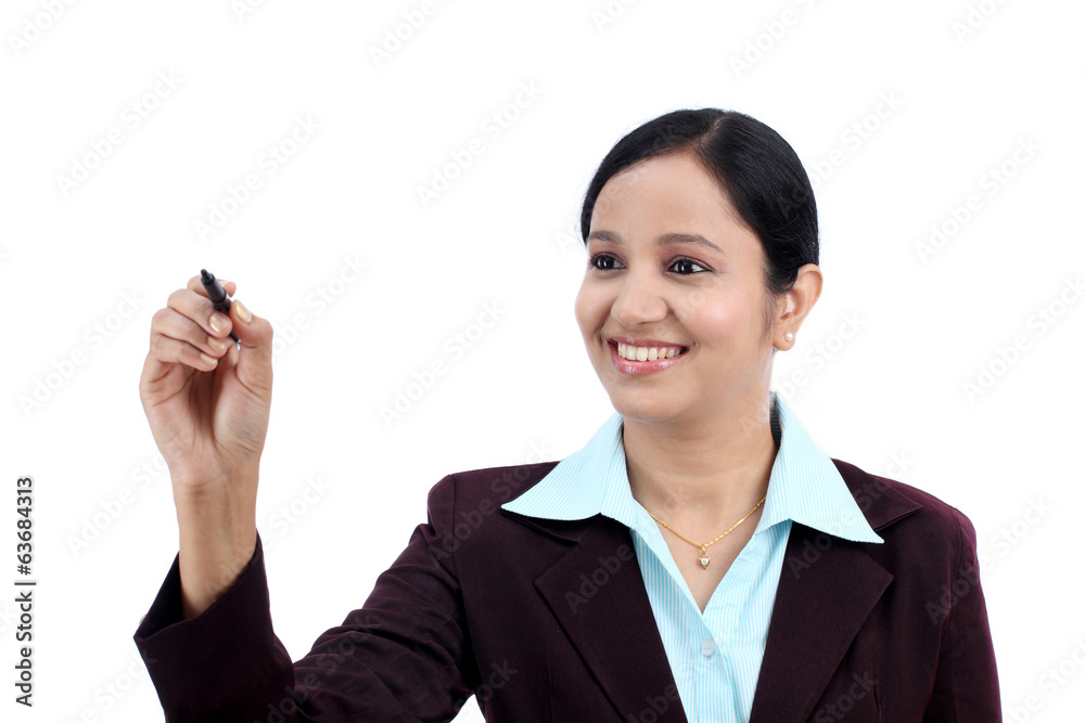 Business woman writing with pen on virtual scree Business woman writing with pen on virtual scree