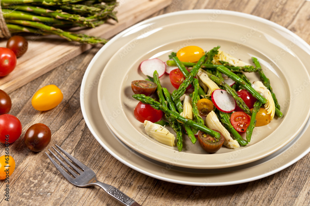 Vegetable salad with asparagus and tomato