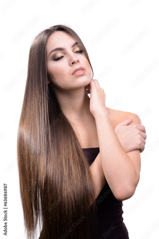 Beautiful young woman with long hair isolated on white Beautiful young woman with long hair isolated on white