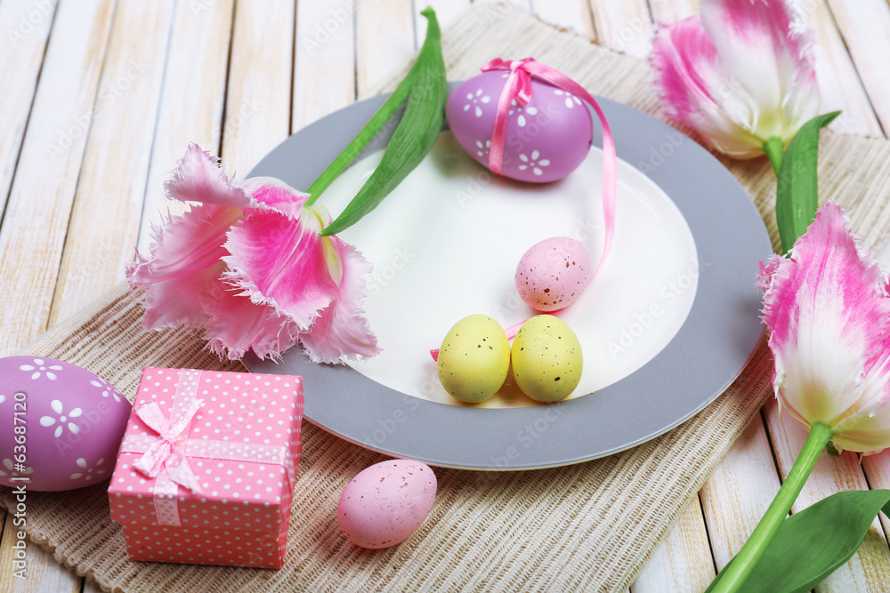 Easter table setting with tulips and eggs - obrazy, fototapety, plakaty 