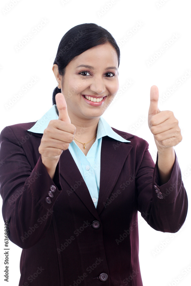 Young business woman with thumbs up gesture Young business woman with thumbs up gesture