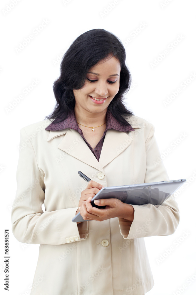 Young business woman working with tablet computer Young business woman working with tablet computer