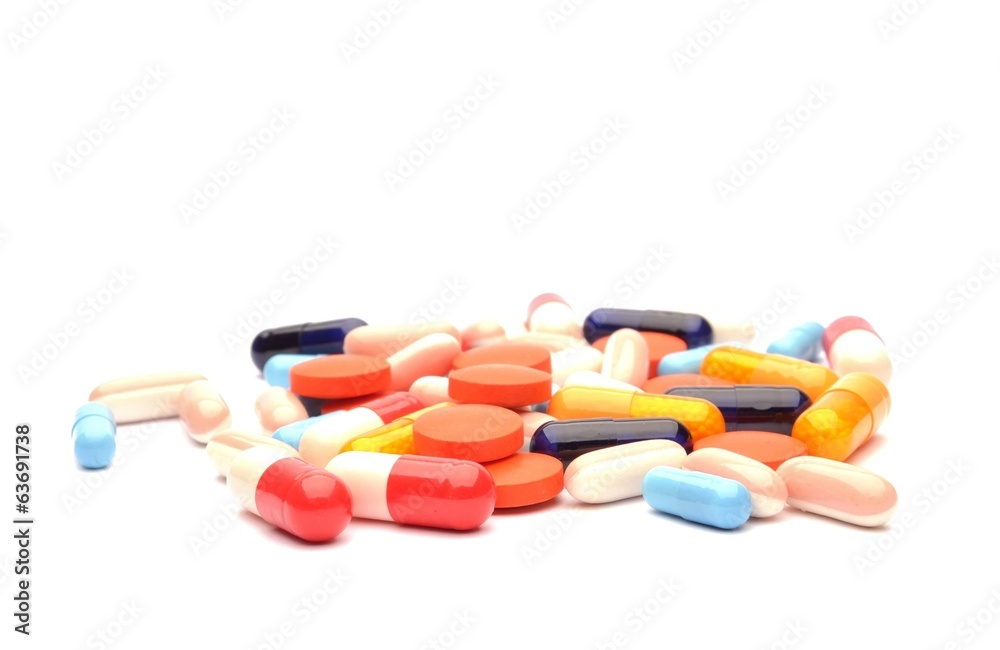 Colourful pills isolated on white background Colourful pills isolated on white background