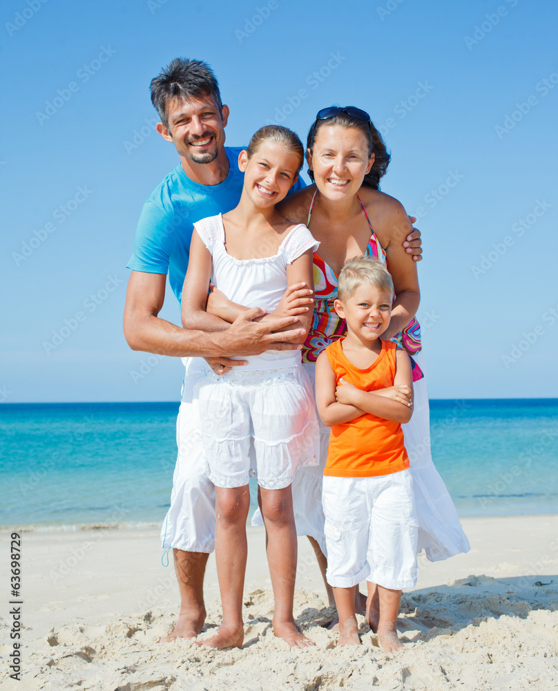 Family on tropical beach