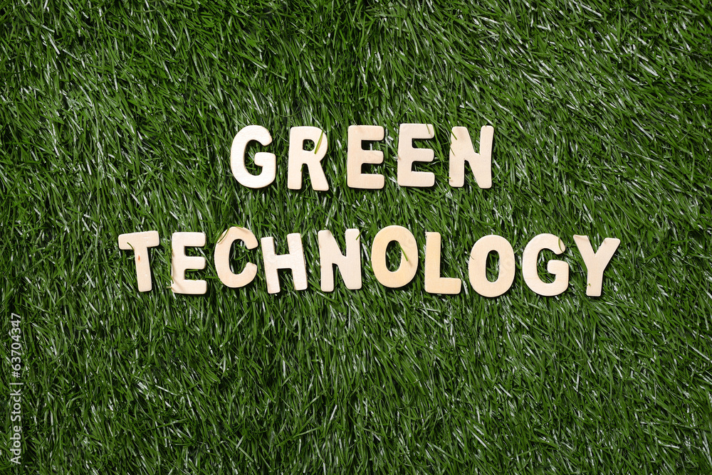 Green Technology Wooden Sign On Grass Green Technology Wooden Sign On Grass