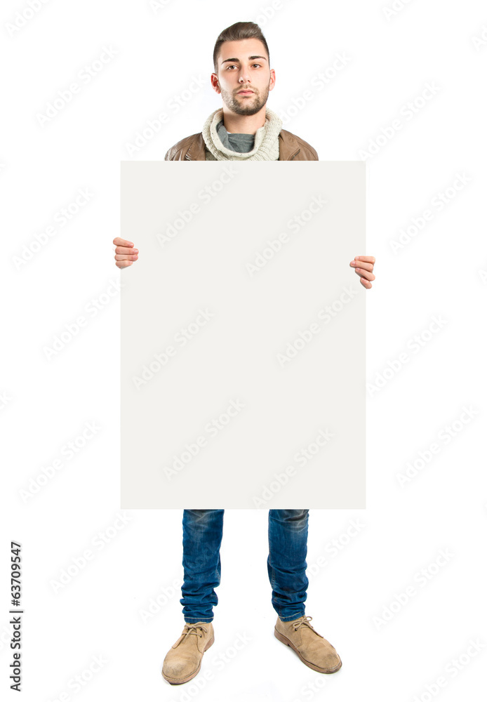 handsome man holding an empty textured cardboard handsome man holding an empty textured cardboard