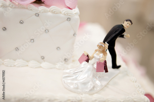 Фотография Bride and Groom cake toppers on a wedding cake