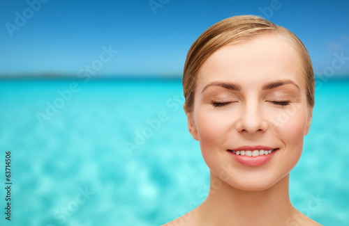 face of beautiful woman with closed eyes