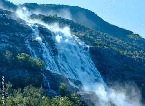 Summer Langfossen waterfall (Norway).