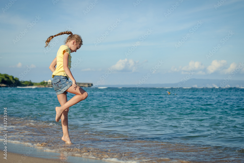 flying jumping beach girl at blue sea shore in summer vacation i