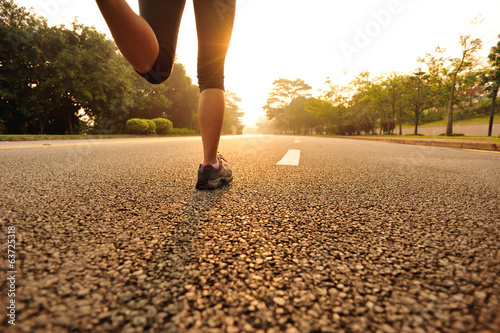 Runner athlete running on road