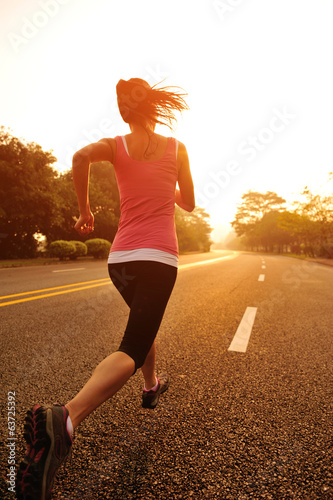 Runner athlete running on road