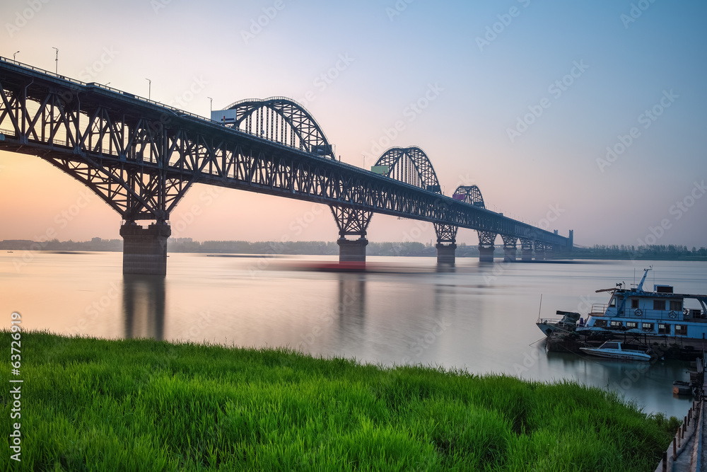 beautiful jiujiang yangtze river bridge at dusk