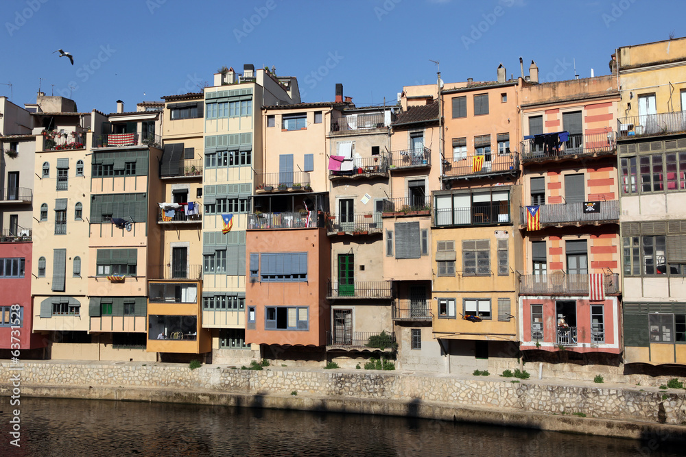 View of the old town with colorful houses reflected in water Jew