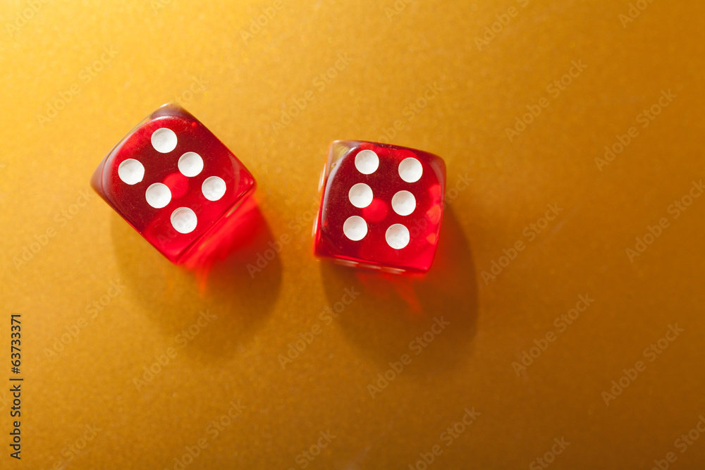 Red dices on gold Red dices on gold