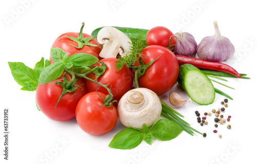 Vegetables for salad with pepper, tomatoes, basil and cucumber