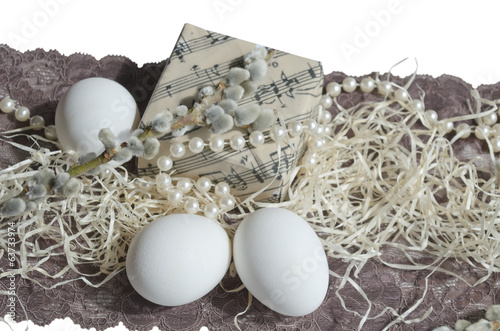 Egg, lace, music box and willow branch