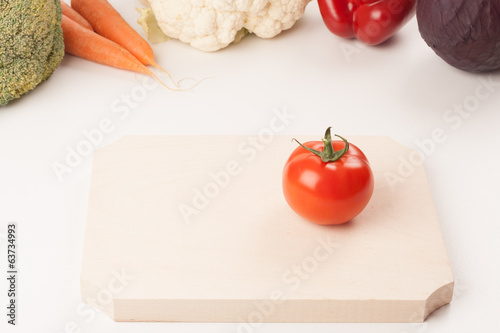 tomato on cutting board