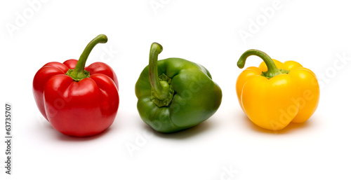 three fresh sweet pepper isolated on white background