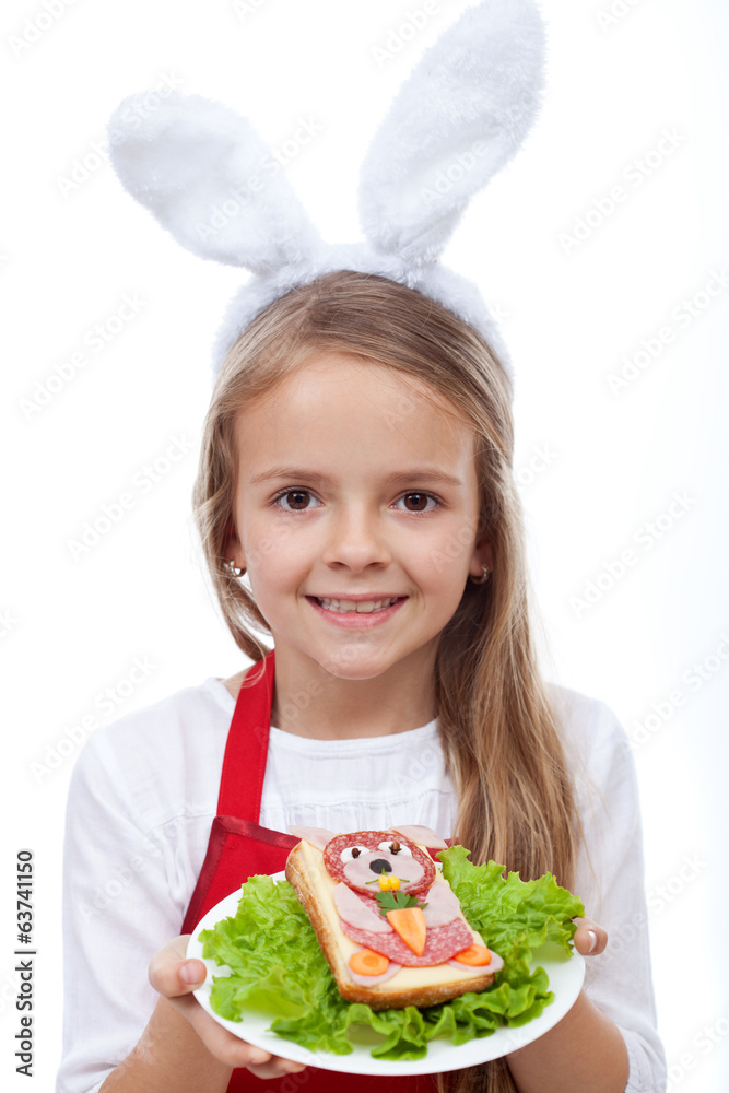 Bunny chef presenting her masterpiece - a rabbit shaped sandwich Bunny chef presenting her masterpiece - a rabbit shaped sandwich