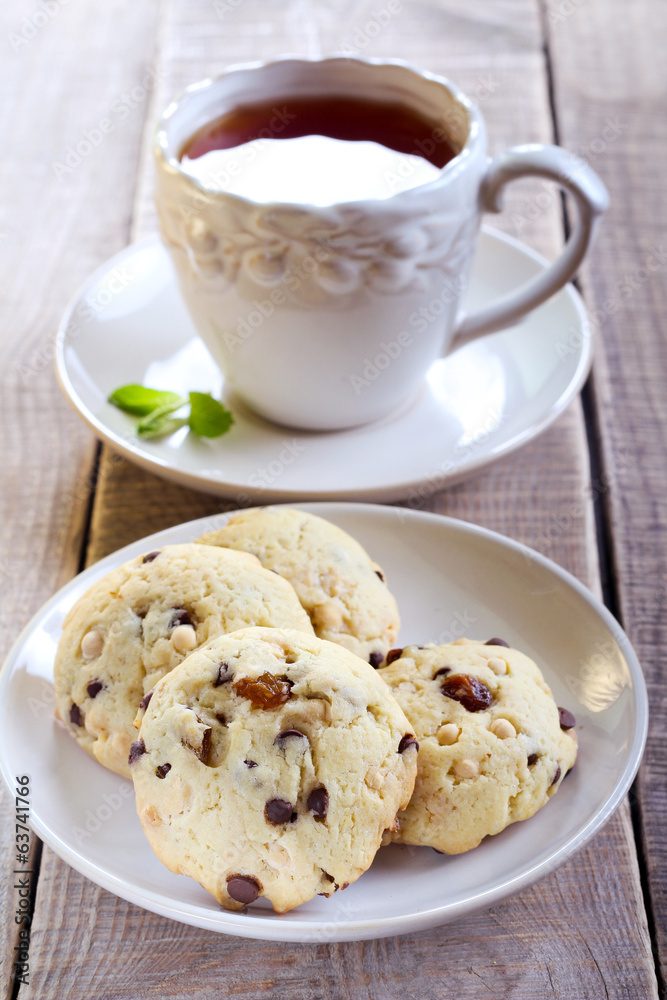 Double chocolate chip cookies and cup of tea Double chocolate chip cookies and cup of tea