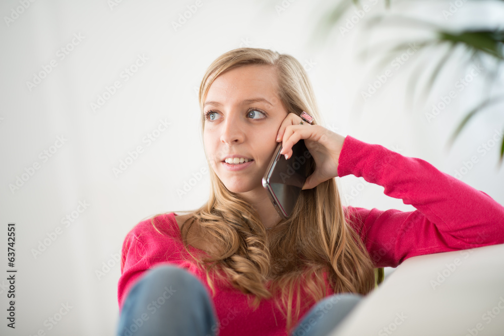 cheerful young woman making a phone call cheerful young woman making a phone call
