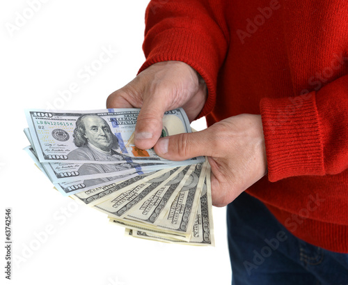 Man'n hands with dollar bills