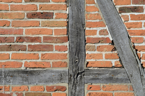Brick wall of the half timbered house background