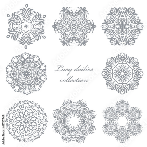 Lacy doilies set isolated on white.