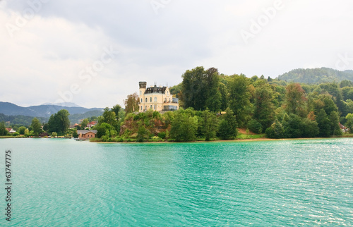 Reifnitz Castle on Lake Worth in Carinthia, Austria photo
