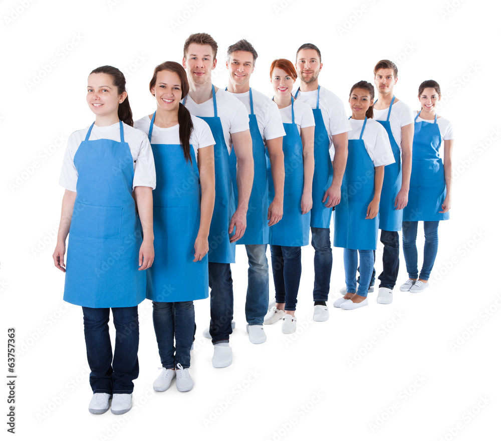 Large group of cleaners standing in a line Large group of cleaners standing in a line