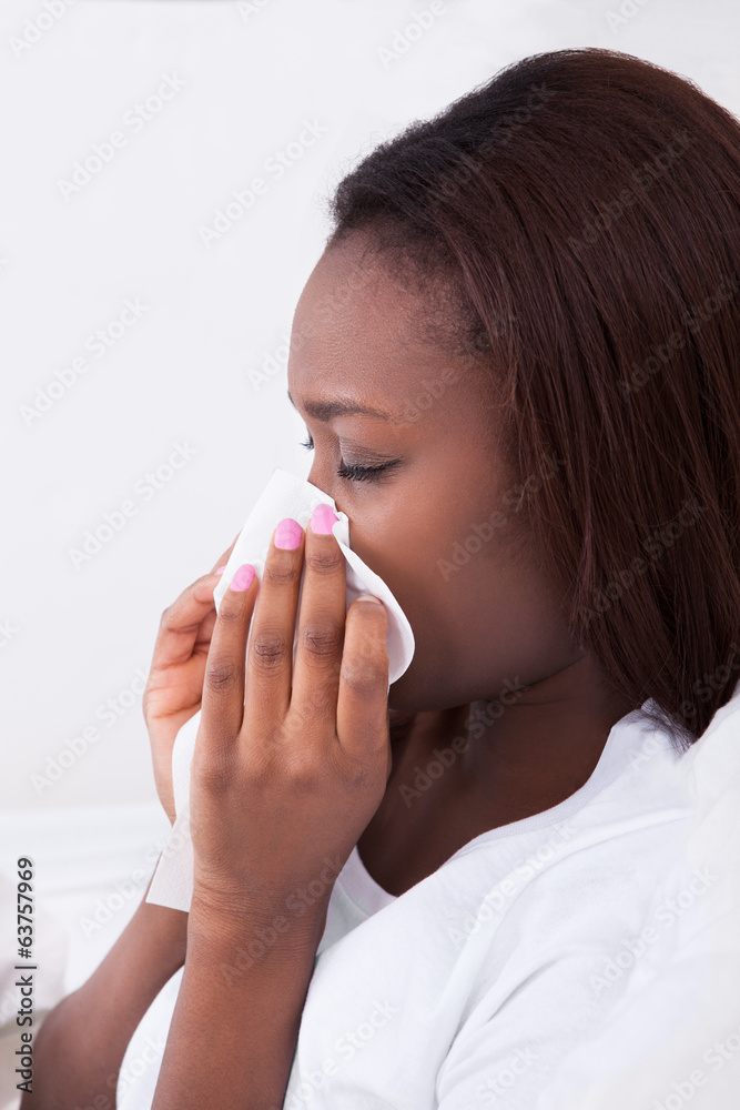 Woman Suffering From Cold At Home Woman Suffering From Cold At Home