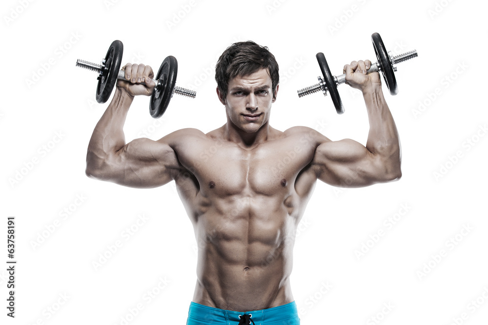 Muscular bodybuilder guy doing exercises with dumbbells over whi Muscular bodybuilder guy doing exercises with dumbbells over whi