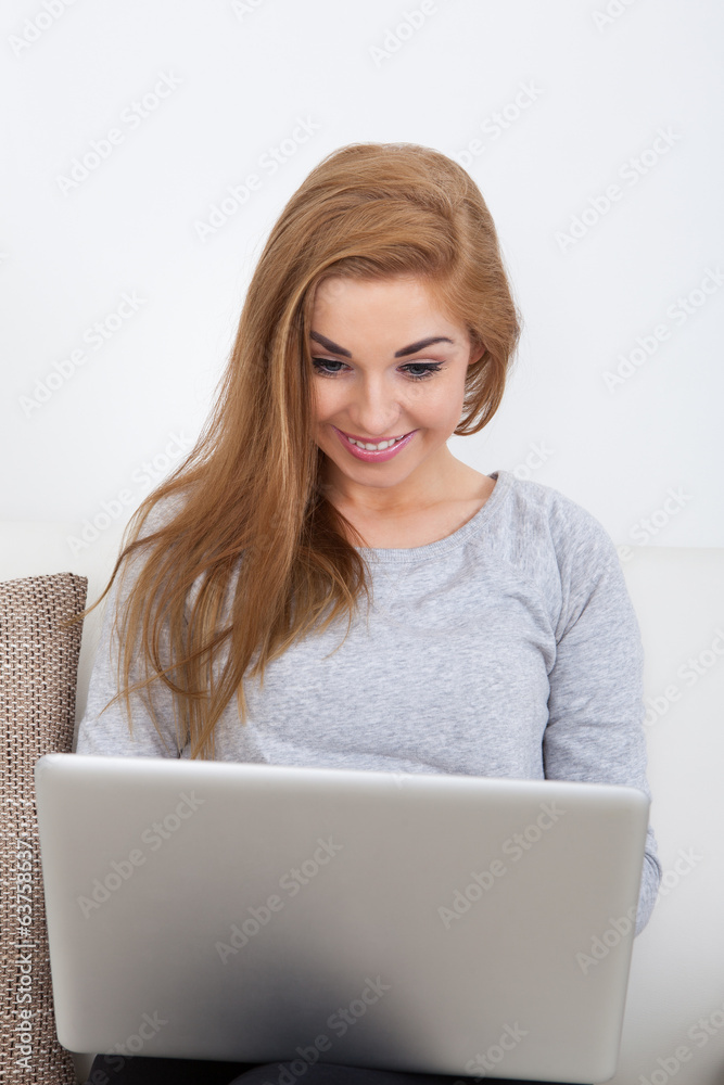 Young Woman Using Laptop Young Woman Using Laptop