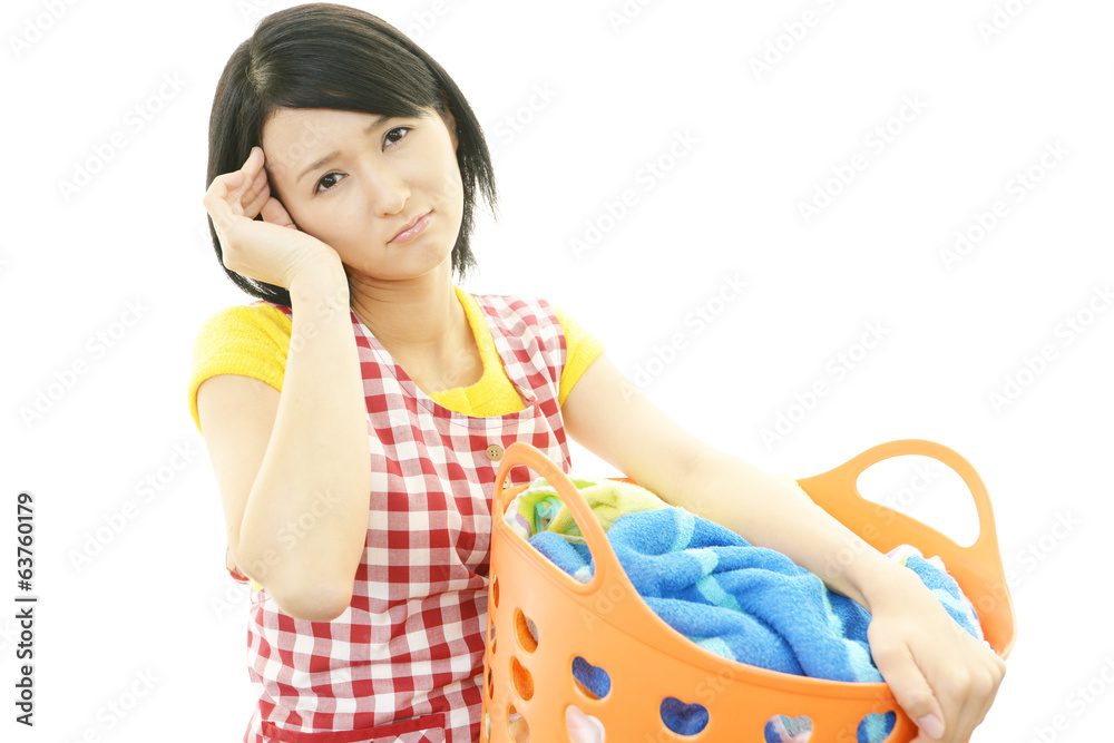 疲れた表情の主婦