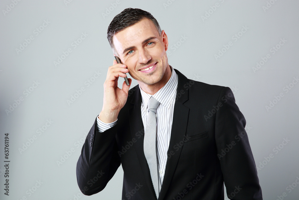 Portrait of a happy businessman talking Portrait of a happy businessman talking