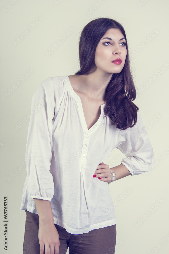 Portrait of a beautiful young woman with long hair. Portrait of a beautiful young woman with long hair.