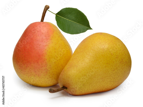 Ripe yellow pear with leaf isolated on white