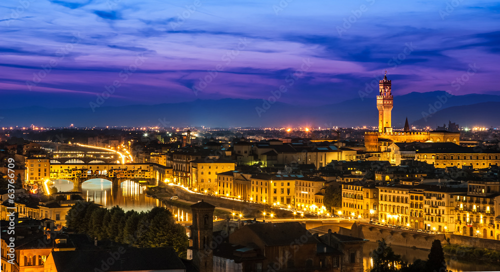 Night view over Arno river in Florence, Italy