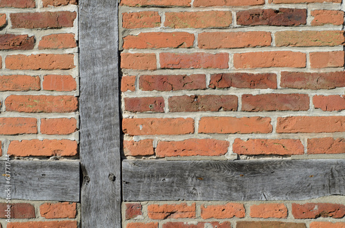 Brick wall of the half timbered house