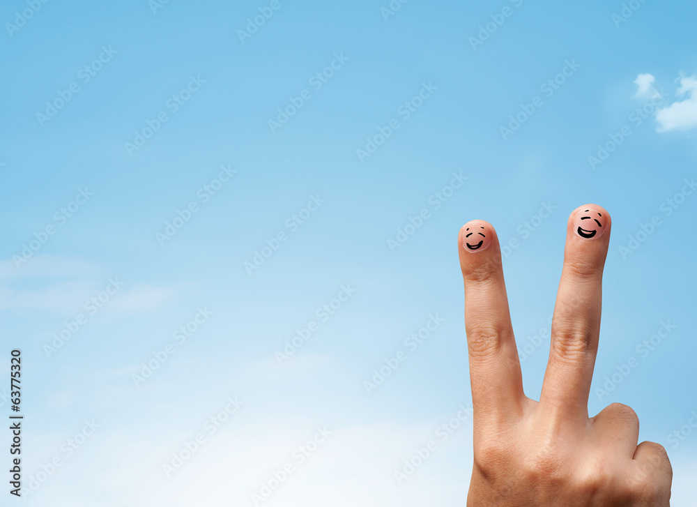 Happy smiley fingers looking at clear blue sky copyspace Happy smiley fingers looking at clear blue sky copyspace