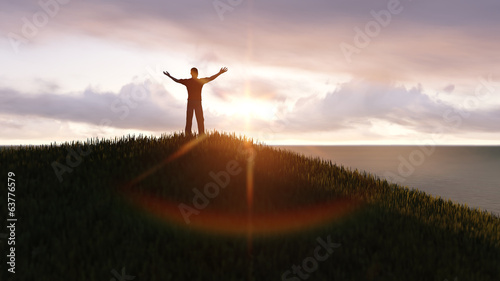 man standing on a mountain top