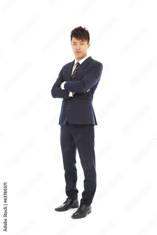 Confident businessman standing and crossed arms Confident businessman standing and crossed arms