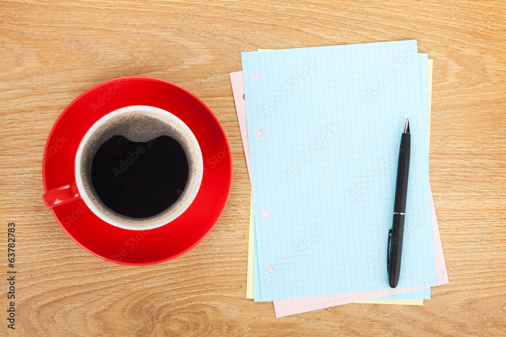 Blank lined papers with coffee cup and pen Blank lined papers with coffee cup and pen