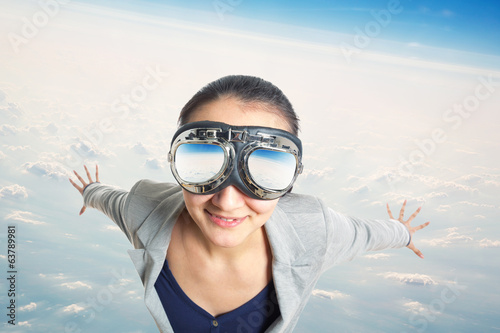 Young woman wearing in aviator goggles