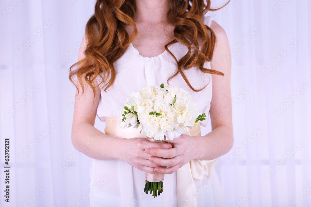 Woman hands holding beautiful wedding bouquet
